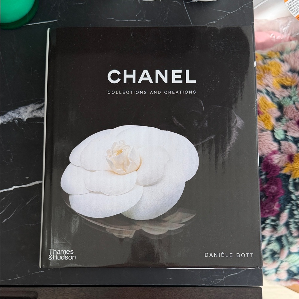 CHANEL Black Book with White Camellia Cover